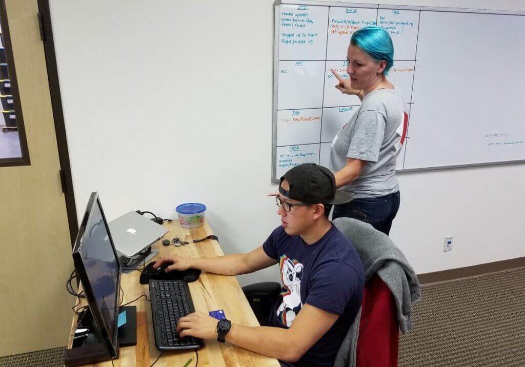 Membership operations associates Jon Chin and Kate Browne help coordinate deployments from the National Operations Center in Dallas. 