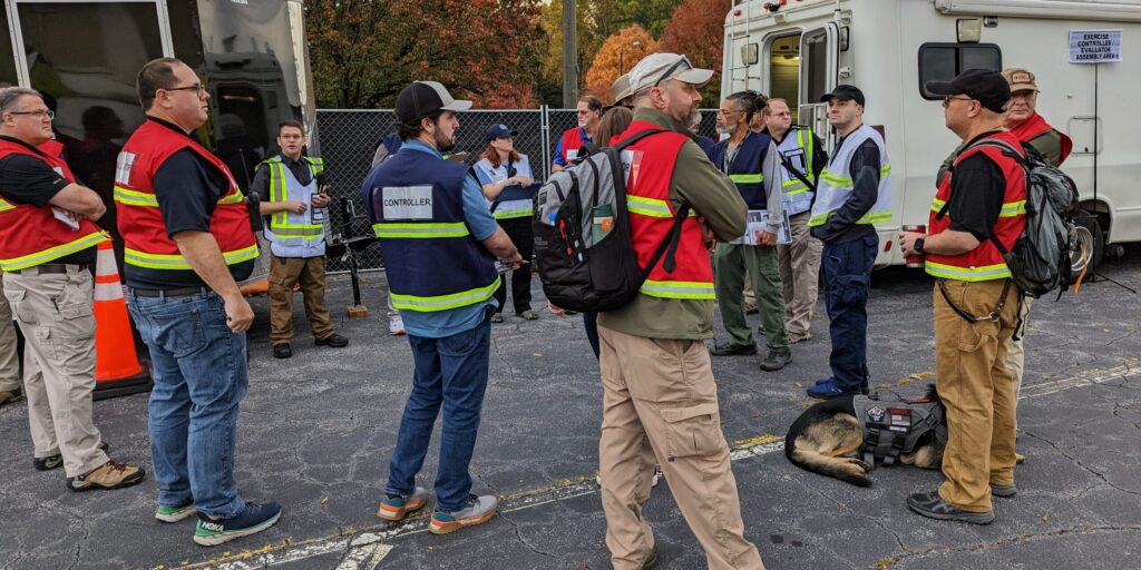volunteers conducting disaster preparedness exercise.
