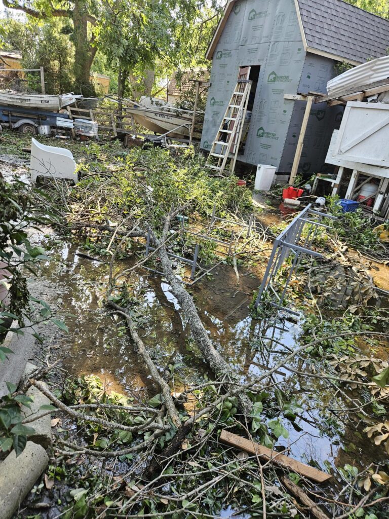 flooding and vegetative debris near home show need for hurricane beryl assistance