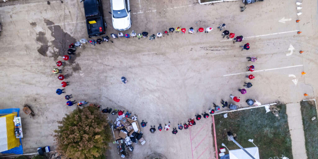 disaster relief volunteers posed in heart shape