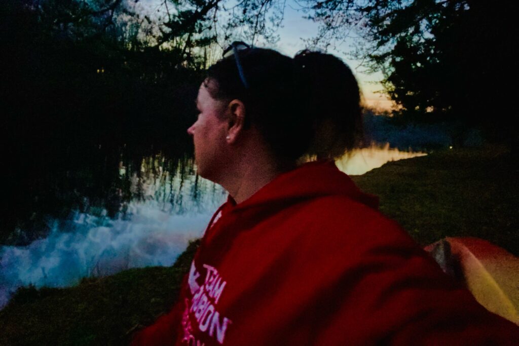 disaster relief volunteer poem author looking at river